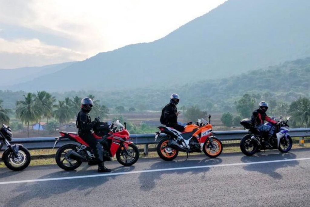 4 riders on tour - group motorcycle riding