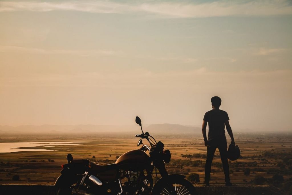 rider on cruiser at sunset