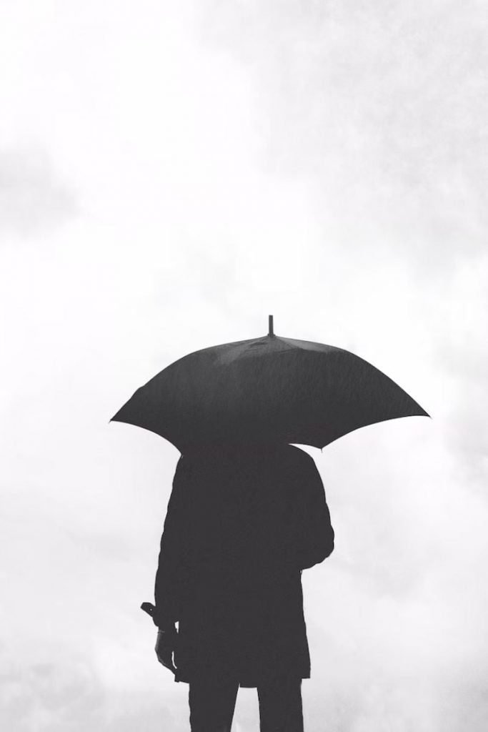 silhouette with umbrella