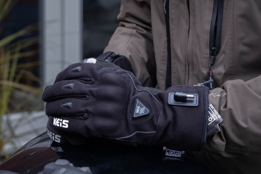 rider clasped hands on bike tank